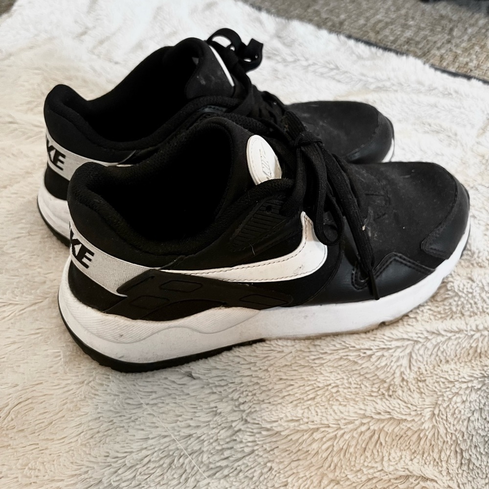 Nike Woman’s Black Athletic Shoes Size 7.5